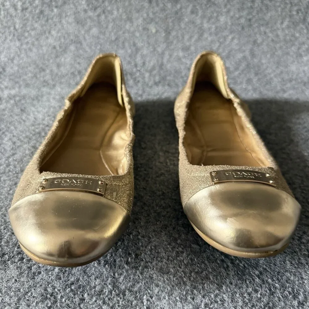 Coach Darsi Gold Metallic Slip-On Ballet Flat Logo Plate Cap Toe Shoe Size 8.5